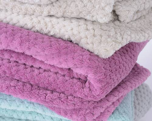 soft coral fleece, dekentjes en plaits